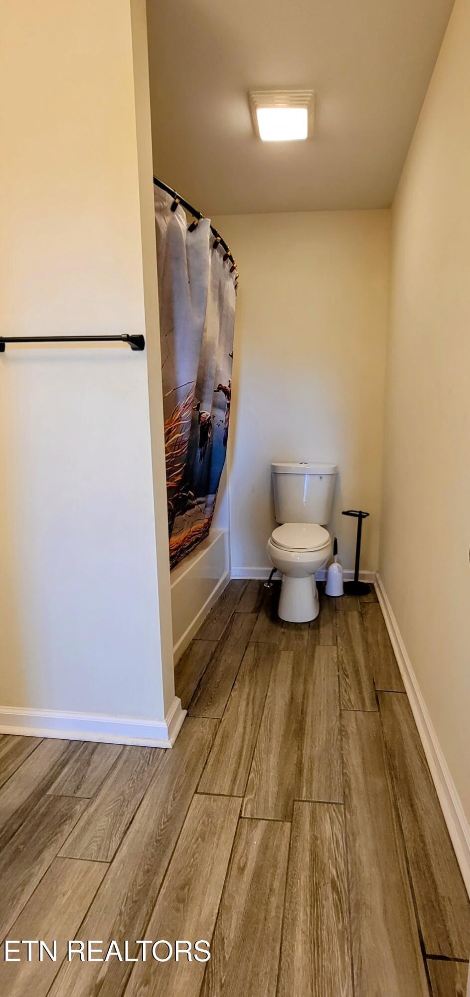 1571 Howell River Road Rutledge, TN 37861 - Photo 6 of 11 a bathroom with a toilet and a shower