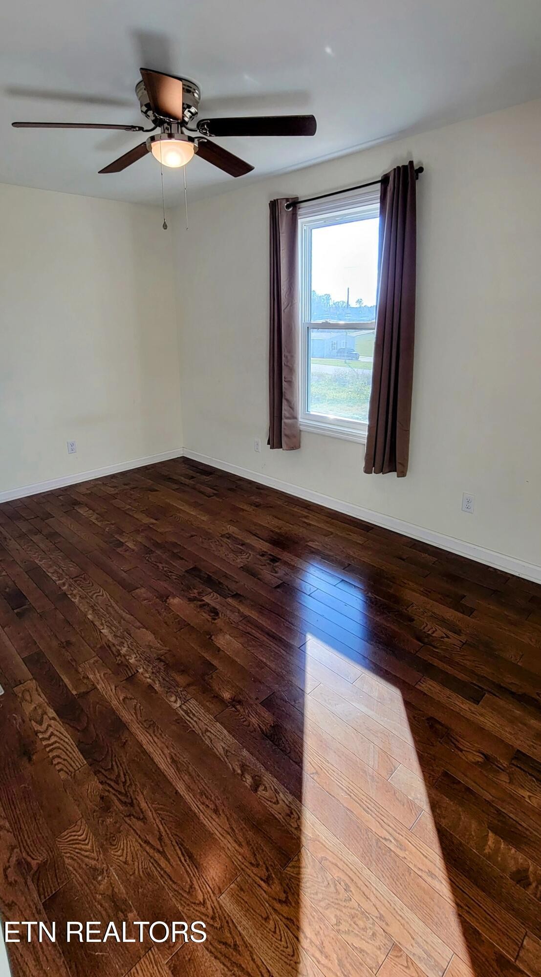 1571 Howell River Road Rutledge, TN 37861 - Photo 8 of 11 a view of a room with wooden floor and window