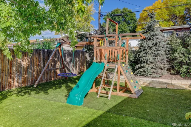a view of a yard with a slide