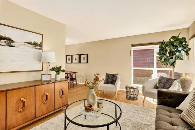 a living room with furniture and a table