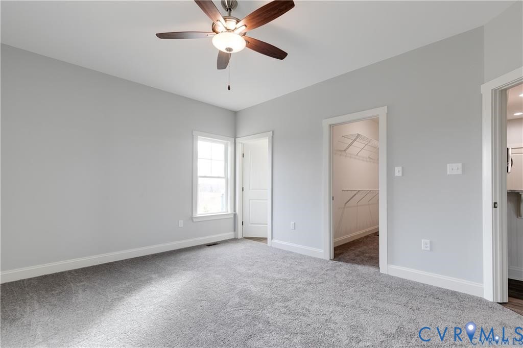 3840 Maidens Road Powhatan, VA 23139 - Photo 13 of 23 Unfurnished bedroom with carpet, a spacious closet