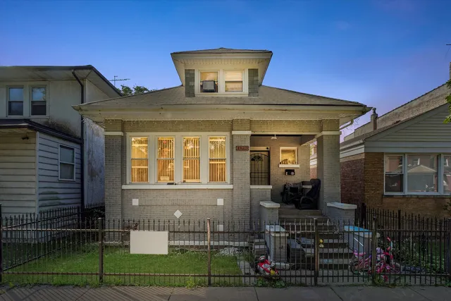 a front view of a house with entertaining space