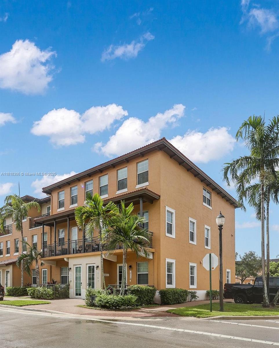 14776 Southwest 10th Street, Unit 10501 Pembroke Pines, FL 33027 - Photo 13 of 16 a front view of a building