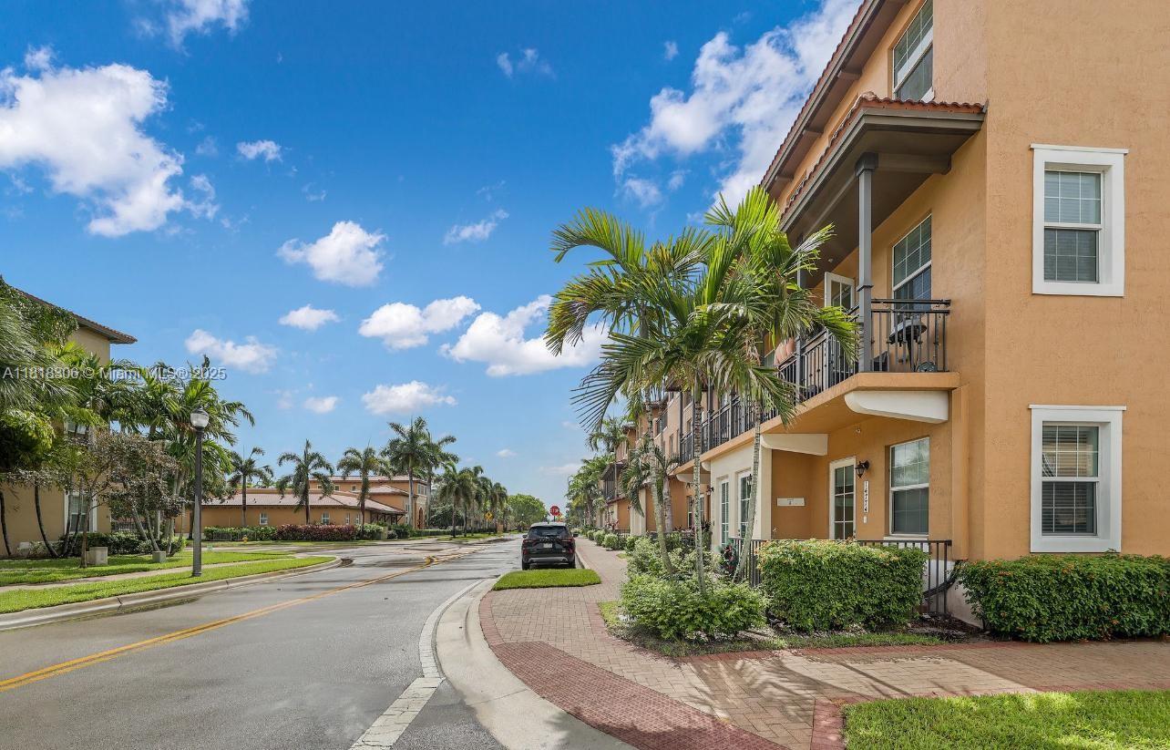 14776 Southwest 10th Street, Unit 10501 Pembroke Pines, FL 33027 - Photo 14 of 16 a view of a city with tall buildings