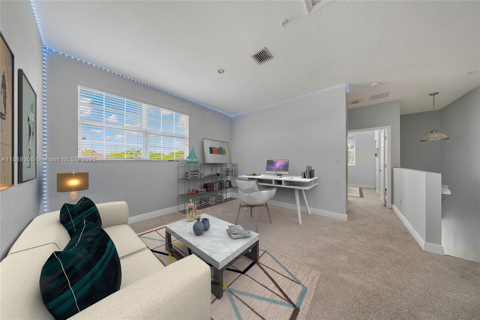 14776 Southwest 10th Street, Unit 10501 Pembroke Pines, FL 33027 - Photo 16 of 16 a living room with furniture and a large window