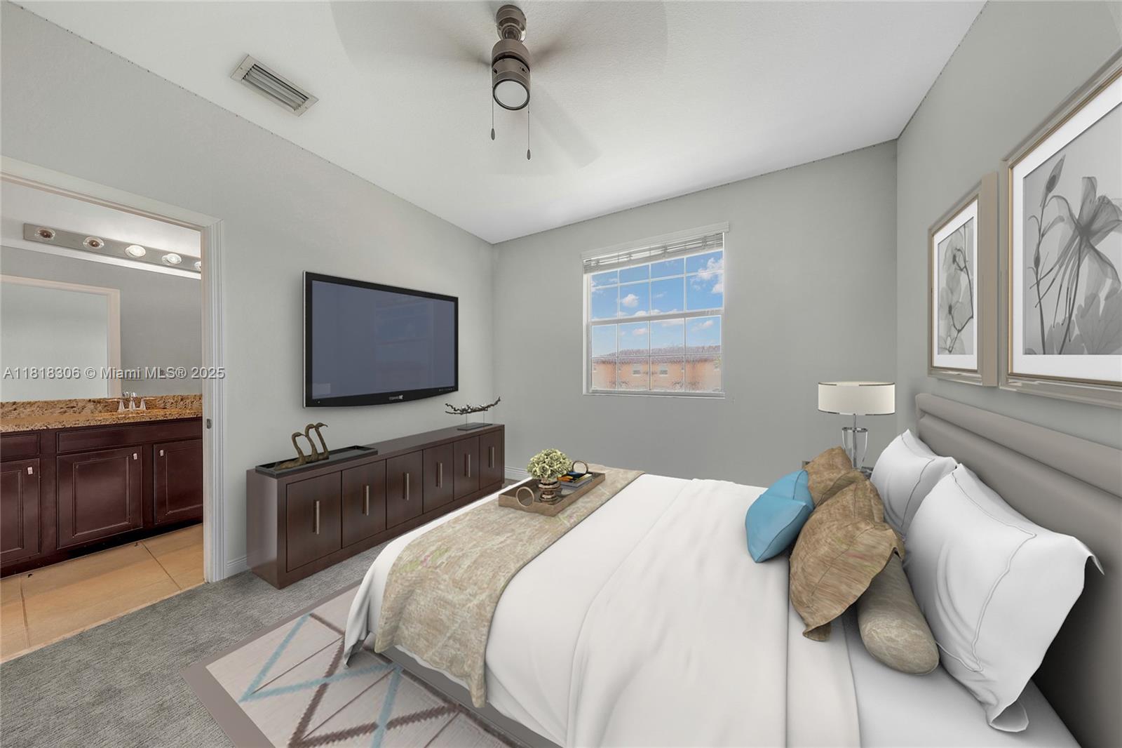 14776 Southwest 10th Street, Unit 10501 Pembroke Pines, FL 33027 - Photo 4 of 16 a bedroom with a bed and a flat screen tv