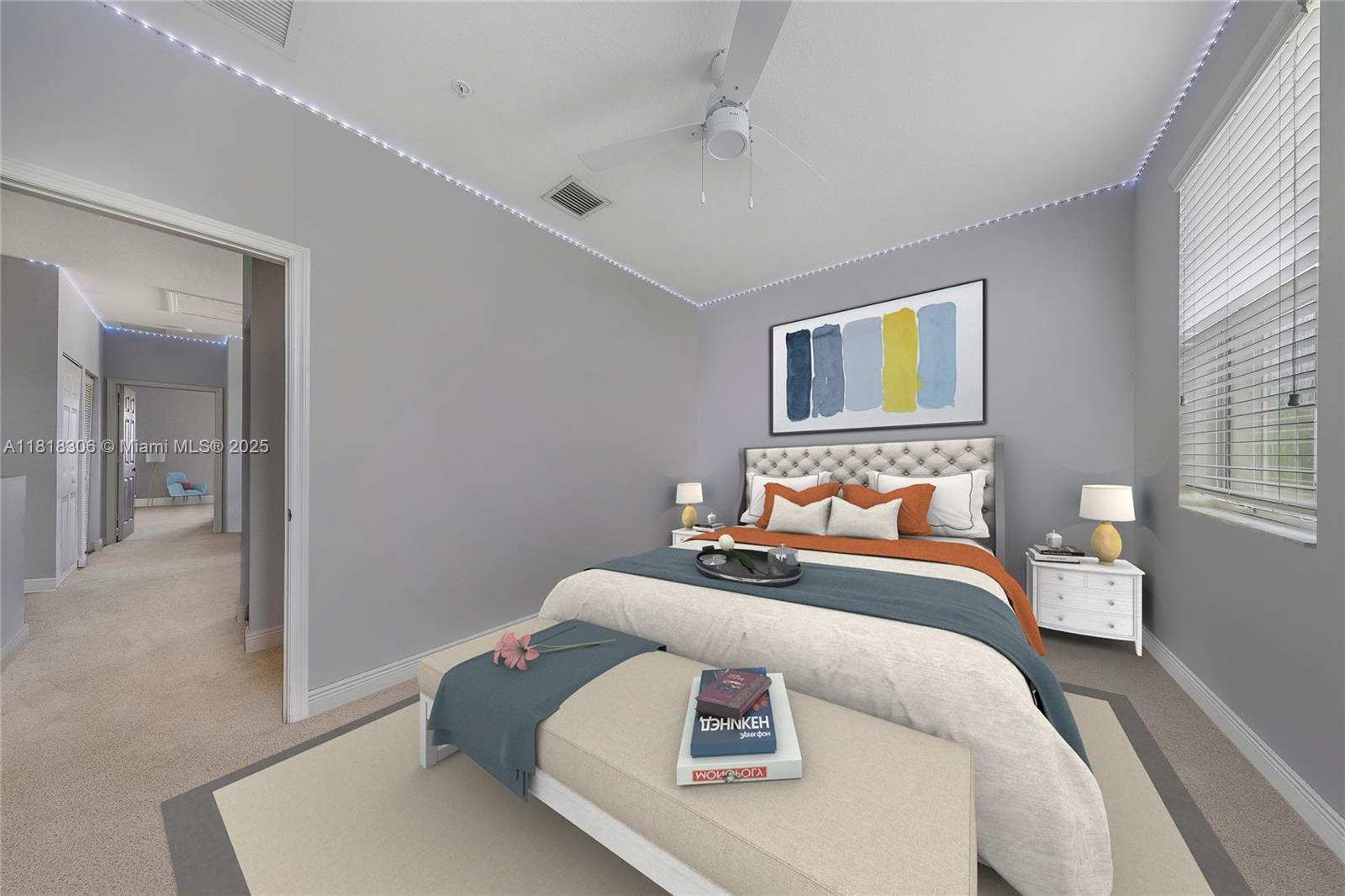 14776 Southwest 10th Street, Unit 10501 Pembroke Pines, FL 33027 - Photo 6 of 16 a bedroom with bed and a window