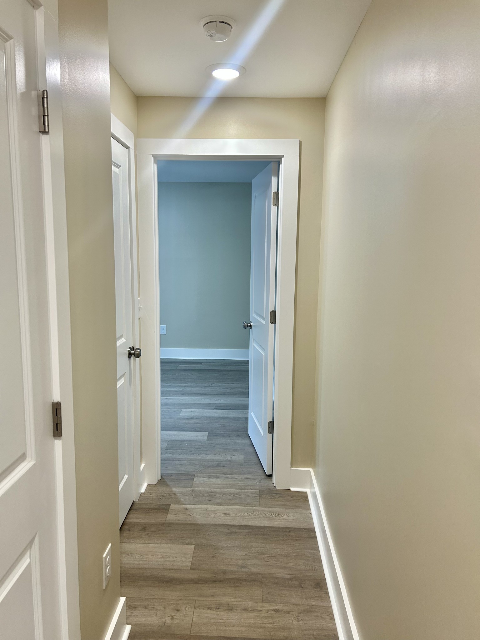 113 West Coffee Street Manchester, TN 37355 - Photo 13 of 31 a view of a hallway with wooden floor and a bathroom