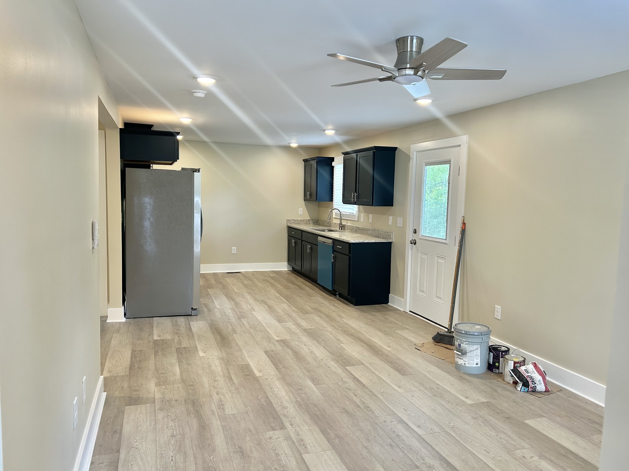 113 West Coffee Street Manchester, TN 37355 - Photo 5 of 31 wooden floor in kitchen and a room with wooden floor