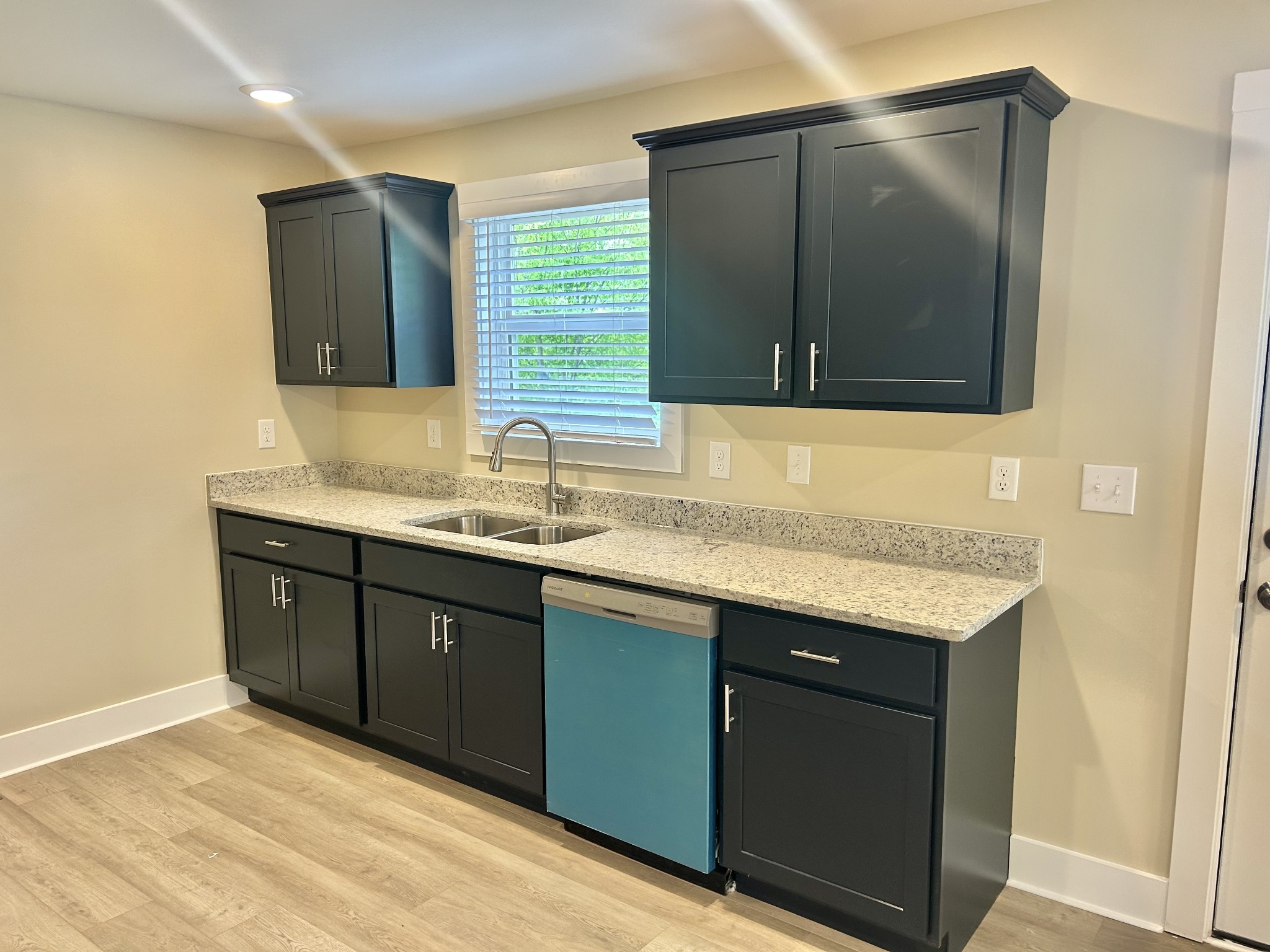 113 West Coffee Street Manchester, TN 37355 - Photo 8 of 31 a bathroom with a granite countertop sink and mirror