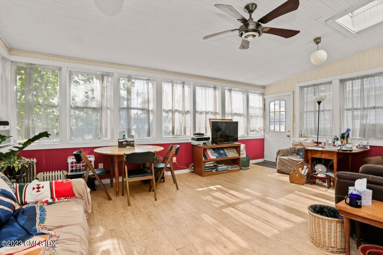 21 Ridge Street Greenwich, CT 06830 - Photo 9 of 15 a view of a livingroom with furniture window and outside view