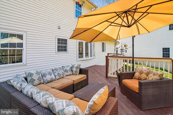 a backyard of a house with lots of green space and fountain