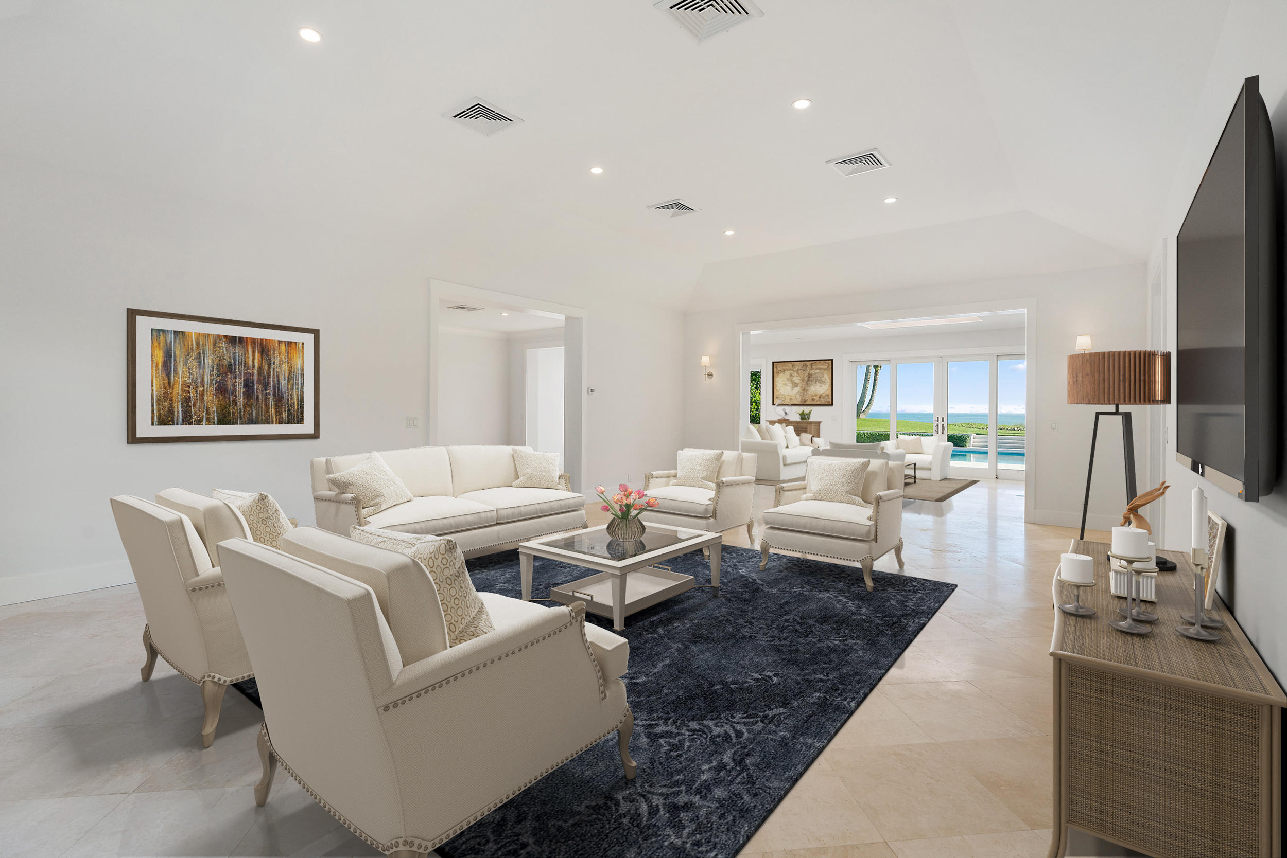 25 South Beach Road Hobe Sound, FL 33455 - Photo 7 of 28 a living room with furniture wooden floor and a flat screen tv