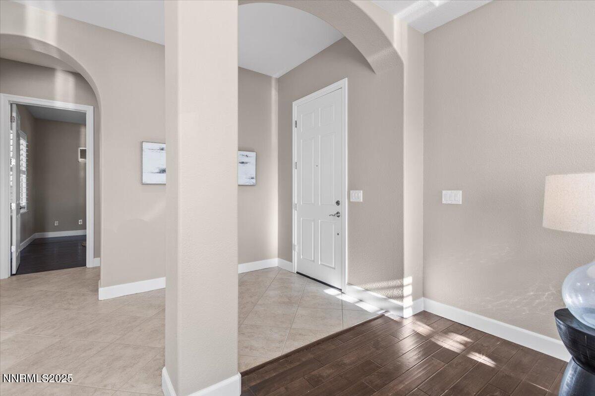 2675 Weymoor Court Reno, NV 89521 - Photo 14 of 75 a view of a hallway with wooden floor