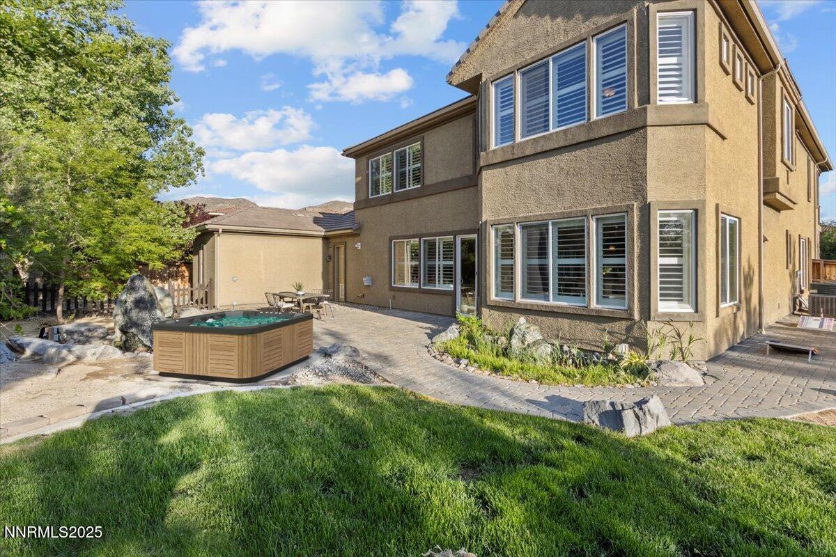 2675 Weymoor Court Reno, NV 89521 - Photo 52 of 75 a front view of a house with a garden