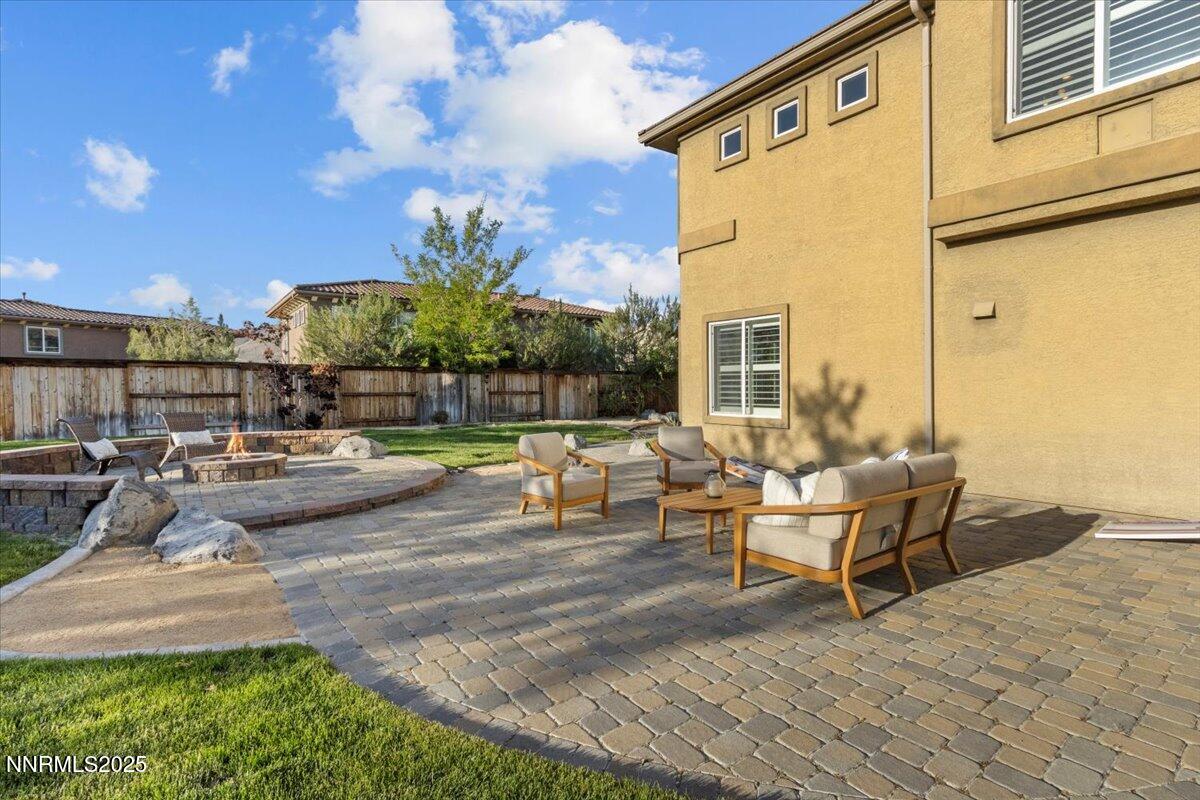 2675 Weymoor Court Reno, NV 89521 - Photo 57 of 75 a view of a patio with swimming pool and sitting area