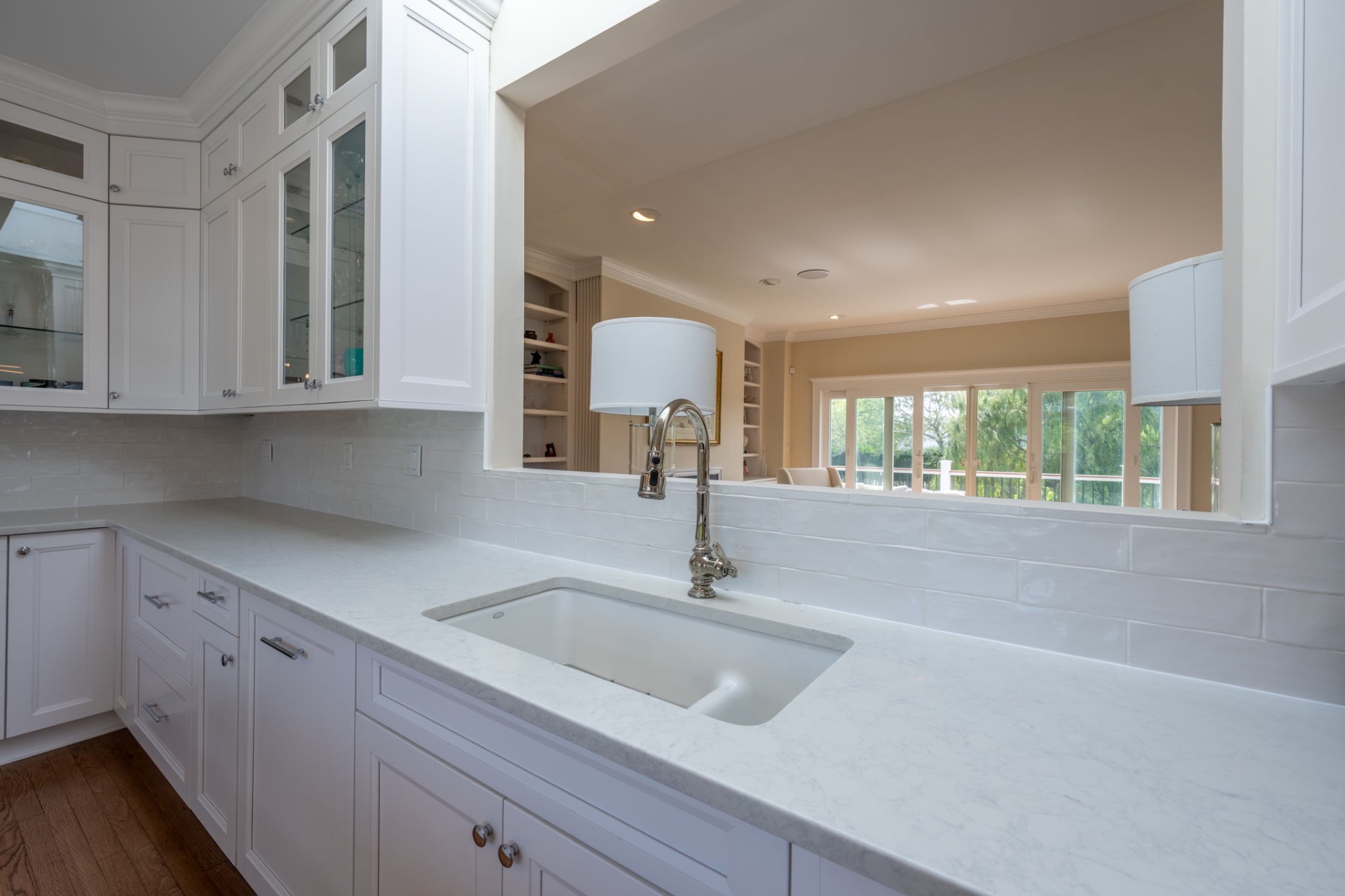 80 Sandpiper Lane Bridgehampton, NY 11932 - Photo 15 of 35 a kitchen with a sink and cabinets