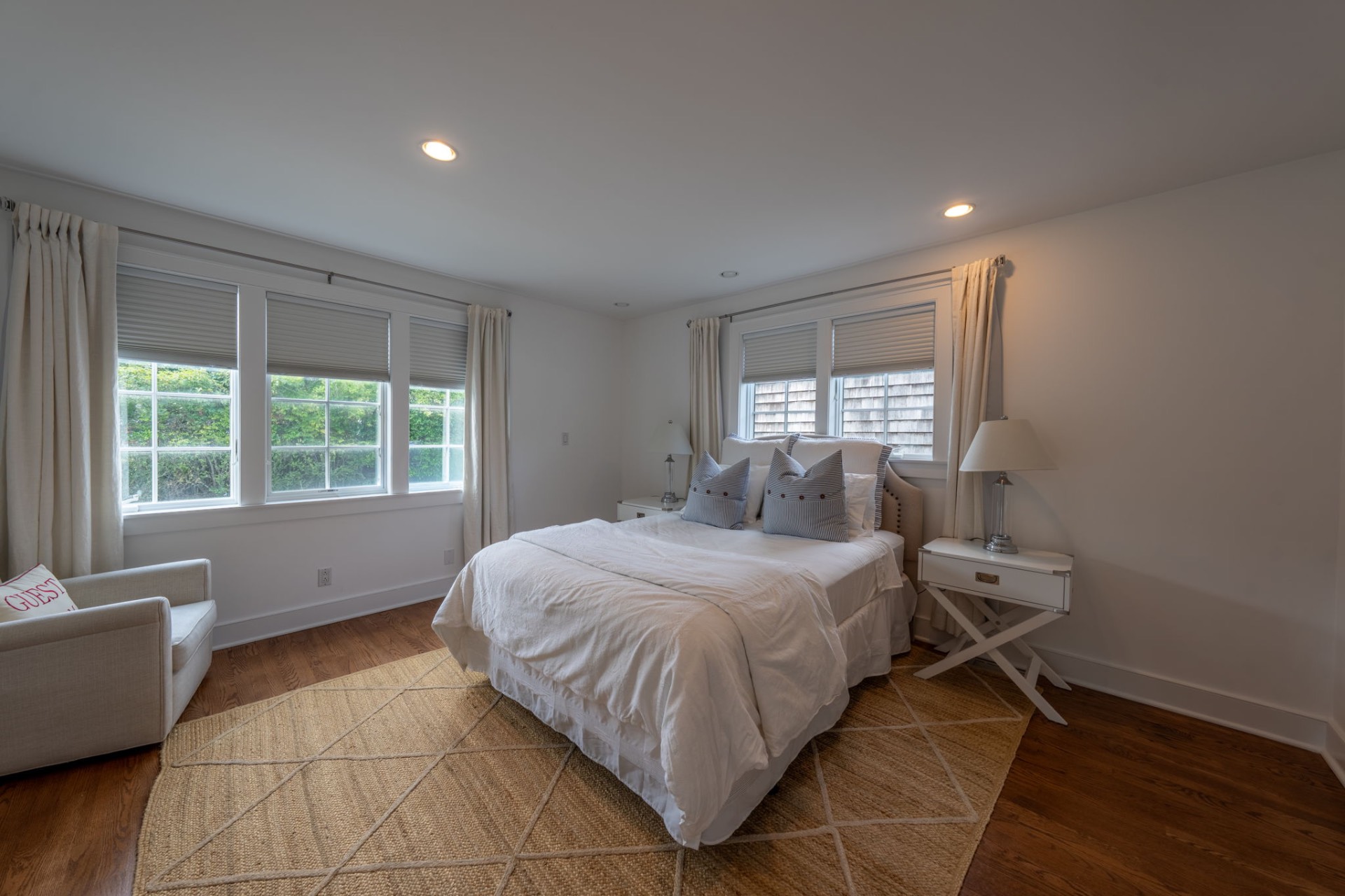 80 Sandpiper Lane Bridgehampton, NY 11932 - Photo 16 of 35 a bedroom with a large bed and a window