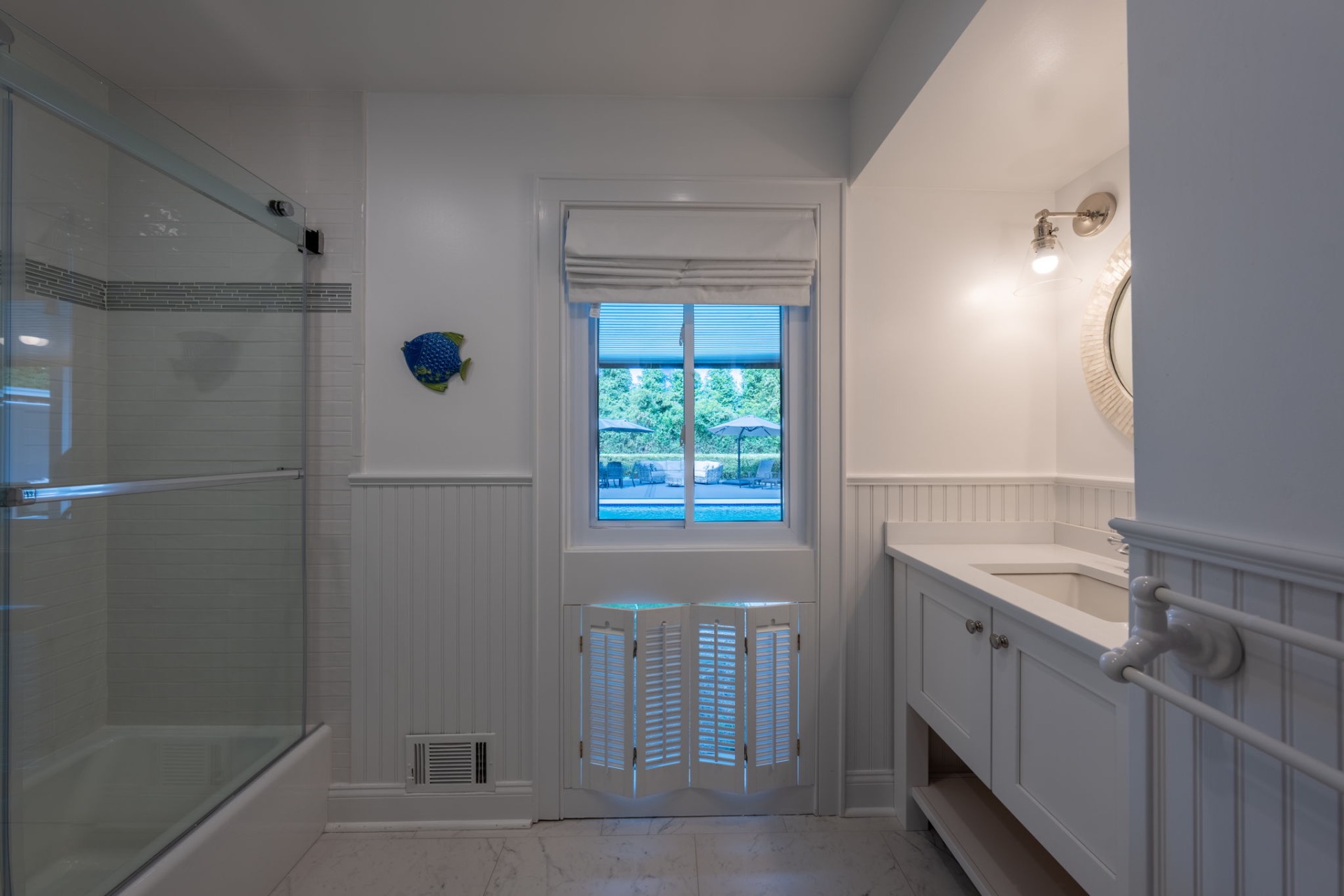 80 Sandpiper Lane Bridgehampton, NY 11932 - Photo 19 of 35 a bathroom with a sink a toilet and shower
