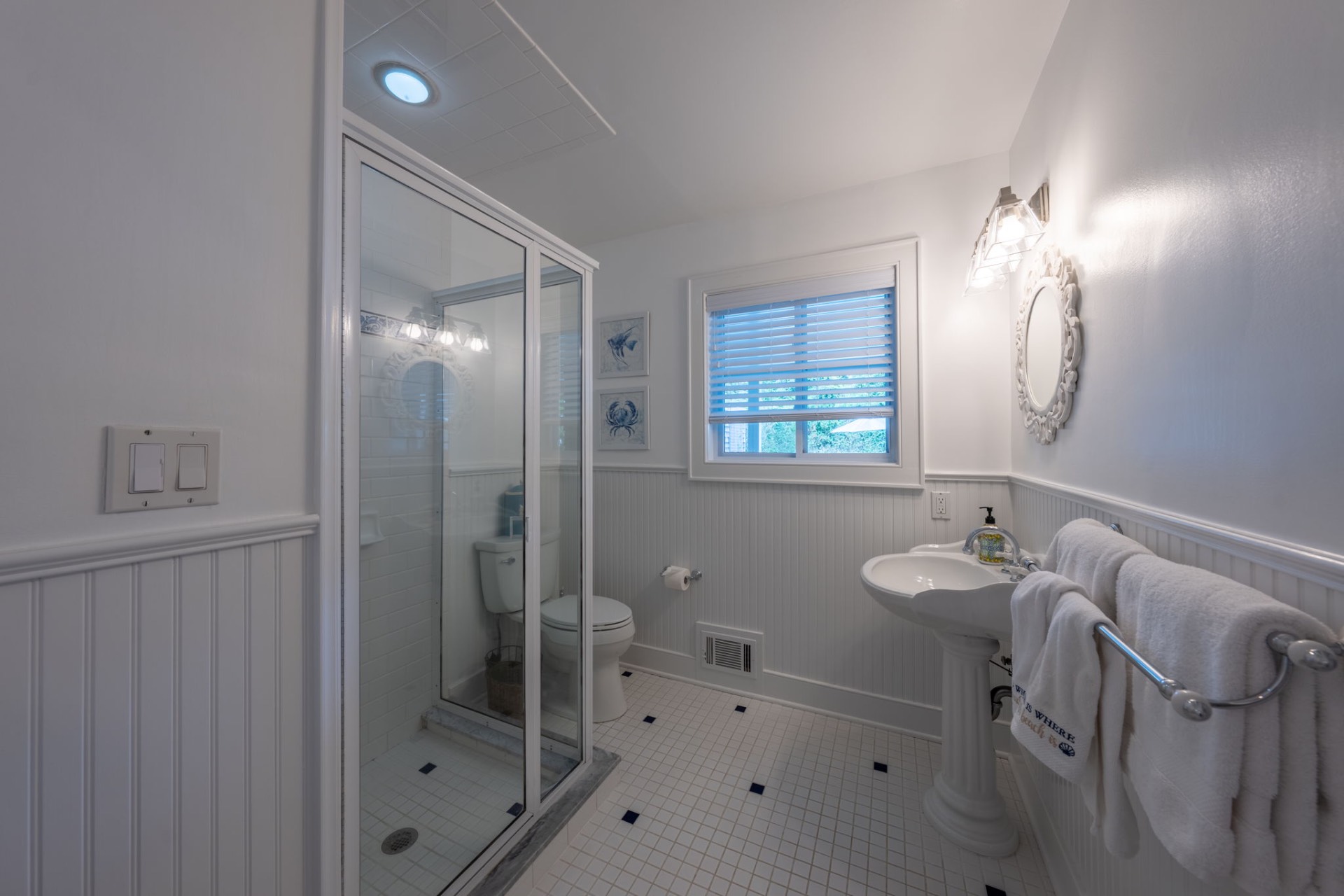 80 Sandpiper Lane Bridgehampton, NY 11932 - Photo 21 of 35 a bathroom with a bathtub shower sink mirror and toilet
