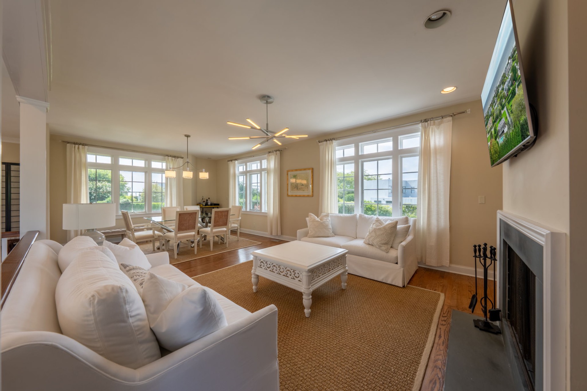 80 Sandpiper Lane Bridgehampton, NY 11932 - Photo 6 of 35 a living room with furniture fireplace and a large window