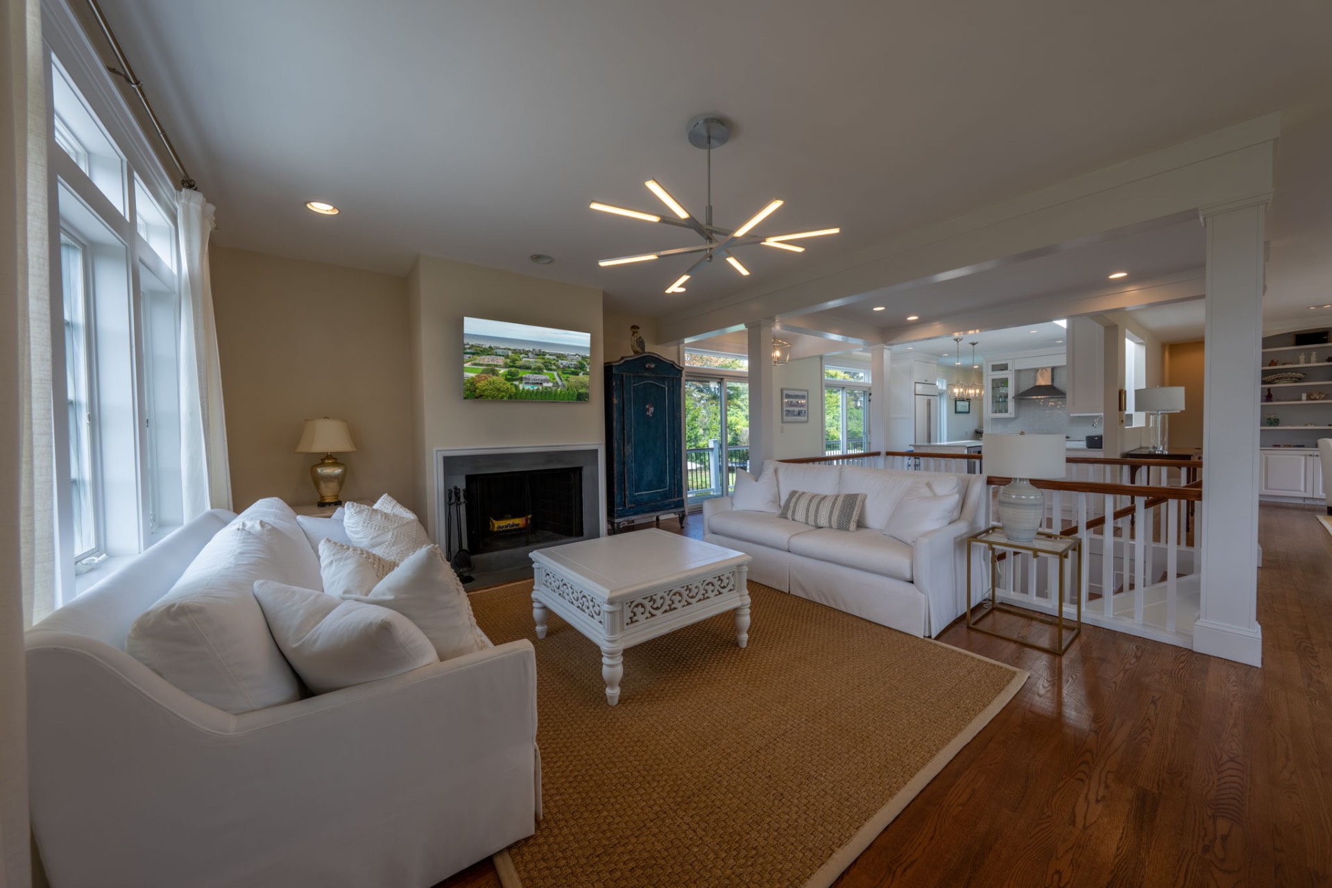 80 Sandpiper Lane Bridgehampton, NY 11932 - Photo 7 of 35 a living room with furniture and a fireplace