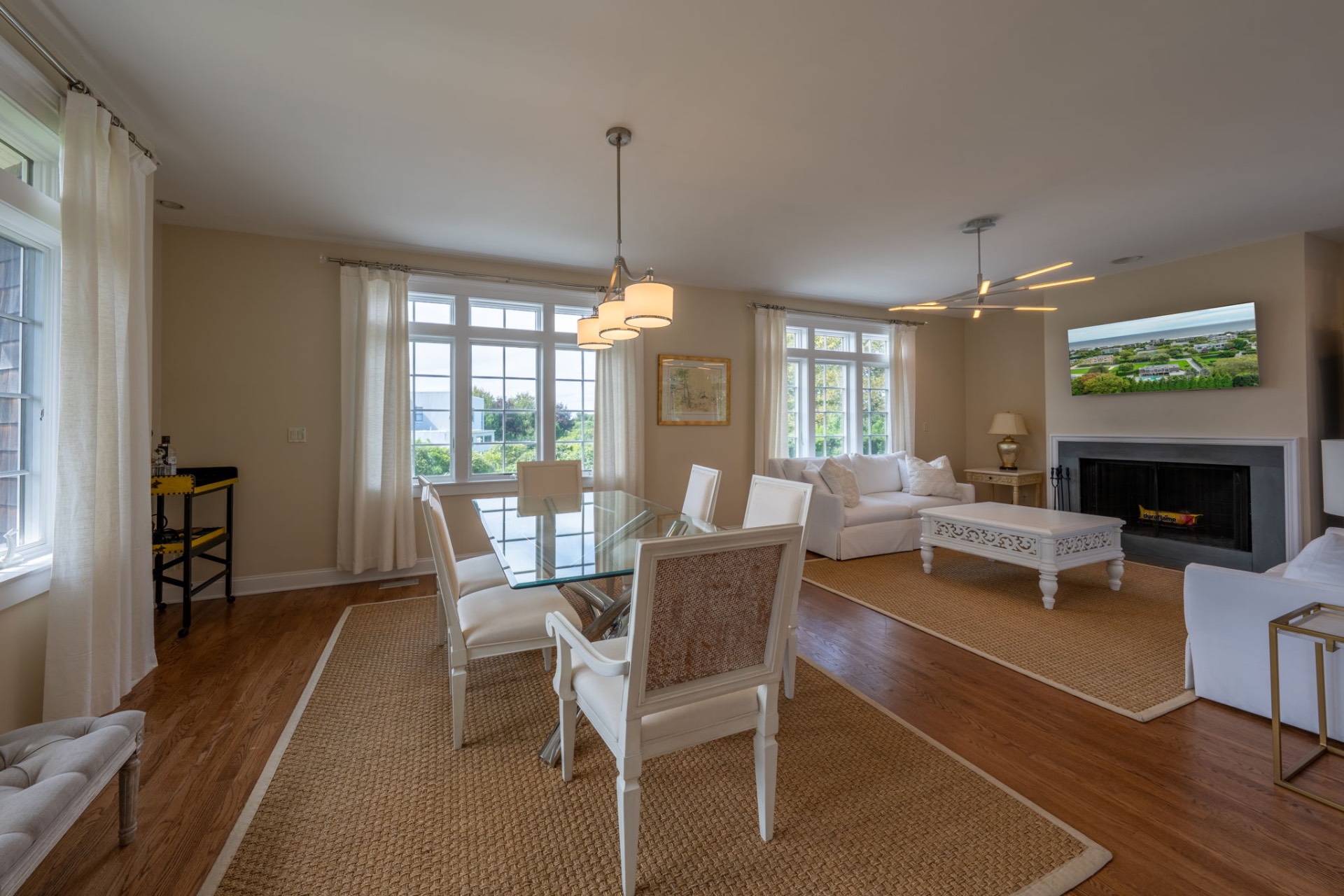 80 Sandpiper Lane Bridgehampton, NY 11932 - Photo 8 of 35 a view of a livingroom with furniture window and wooden floor