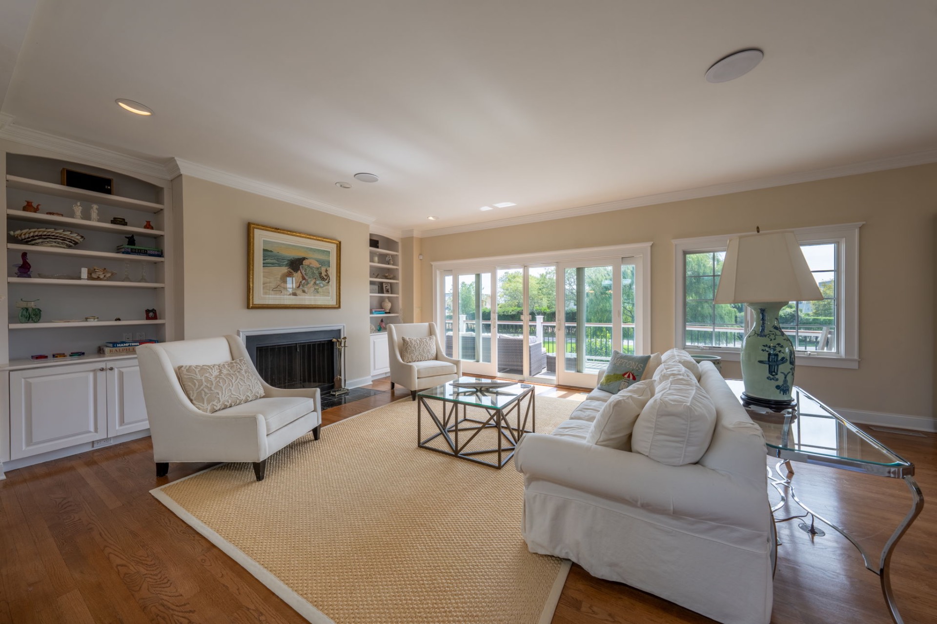 80 Sandpiper Lane Bridgehampton, NY 11932 - Photo 10 of 35 a living room with furniture and a fireplace