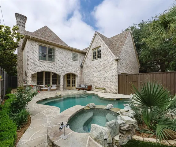 a house view with a outdoor seating space