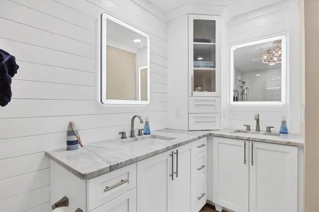 a bathroom with a sink and a vanity