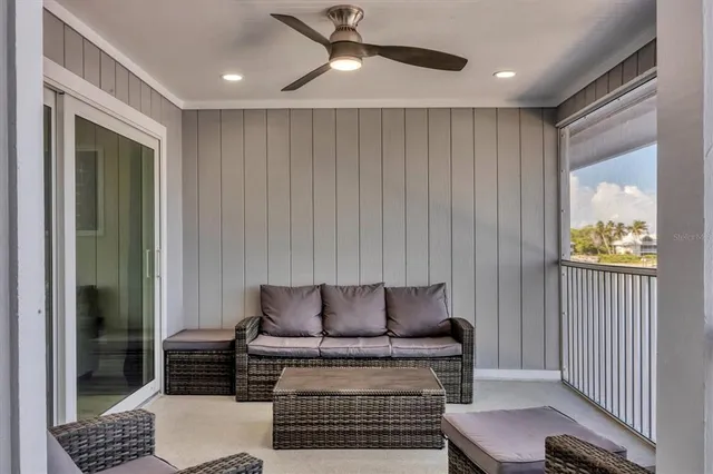 a living room with furniture and a window