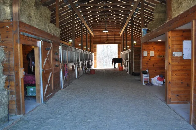 a view of yard with lake and seating space