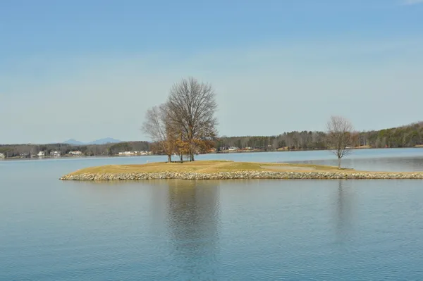 a view of a golf course with a lake