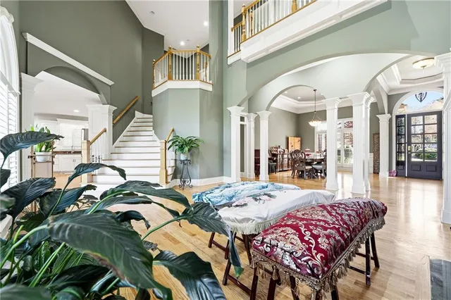 a living room with furniture fireplace and flat screen tv