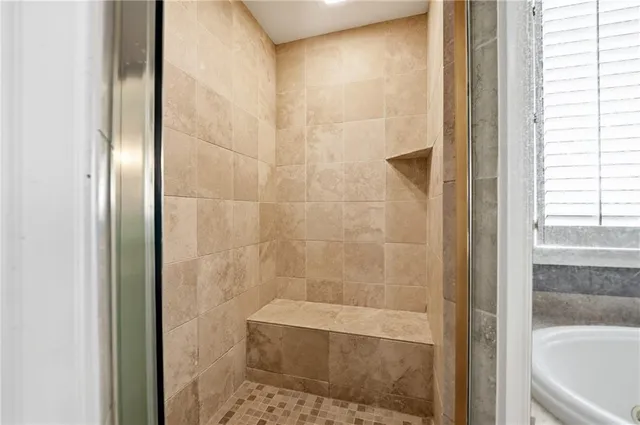 a view of a livingroom with a staircase and a sink