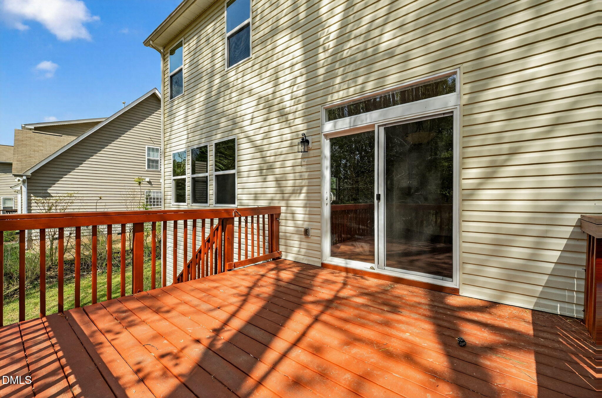 1304 Barnford Mill Road Wake Forest, NC 27587 - Photo 39 of 44 a balcony view with a glass door