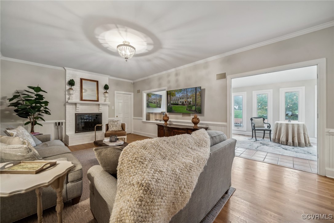 12802 Craystone Circle Midlothian, VA 23113 - Photo 21 of 50 a living room with furniture a fireplace and a large window