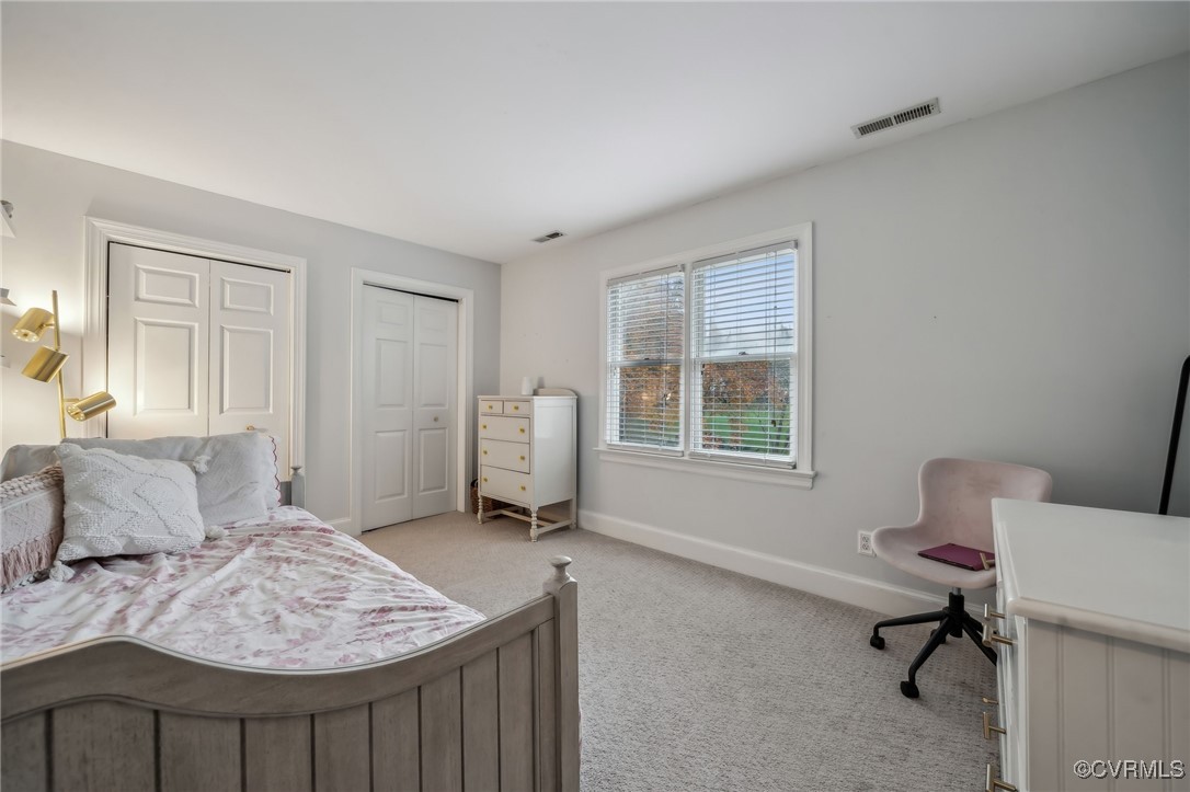 12802 Craystone Circle Midlothian, VA 23113 - Photo 35 of 50 a bedroom with a bed and a window