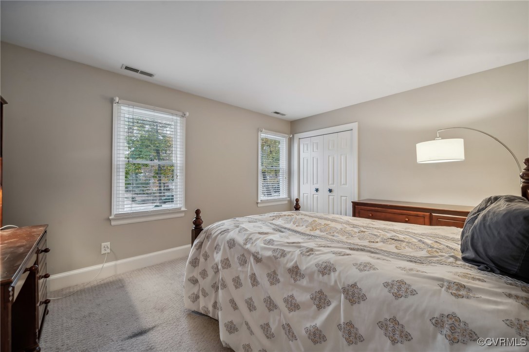 12802 Craystone Circle Midlothian, VA 23113 - Photo 38 of 50 a bedroom with a bed and a window