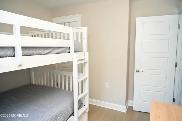 a bathroom with a sink toilet and mirror
