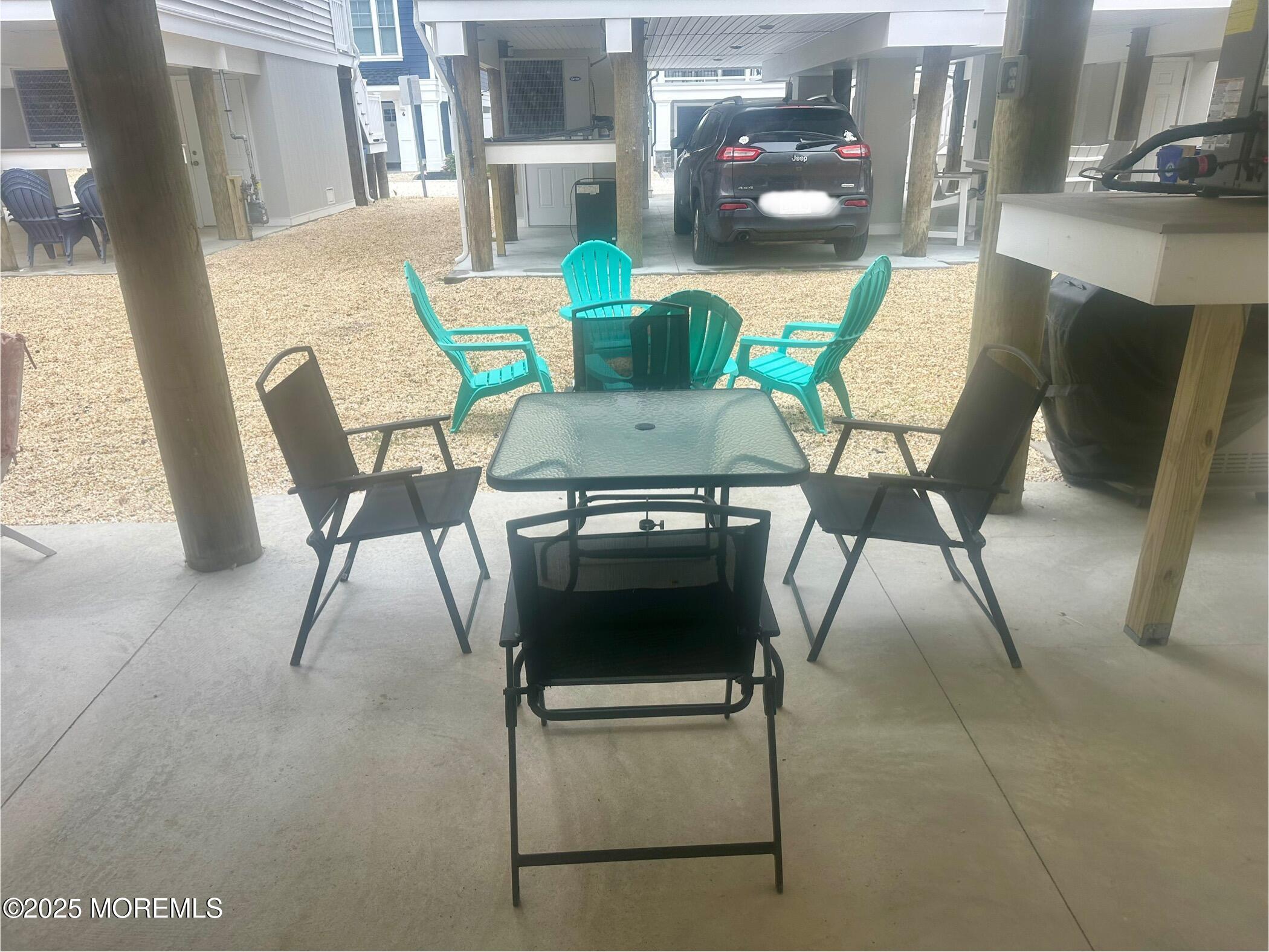 8 Shell Road Mantoloking, NJ 08738 - Photo 23 of 29 a view of a dining room with furniture and a rug