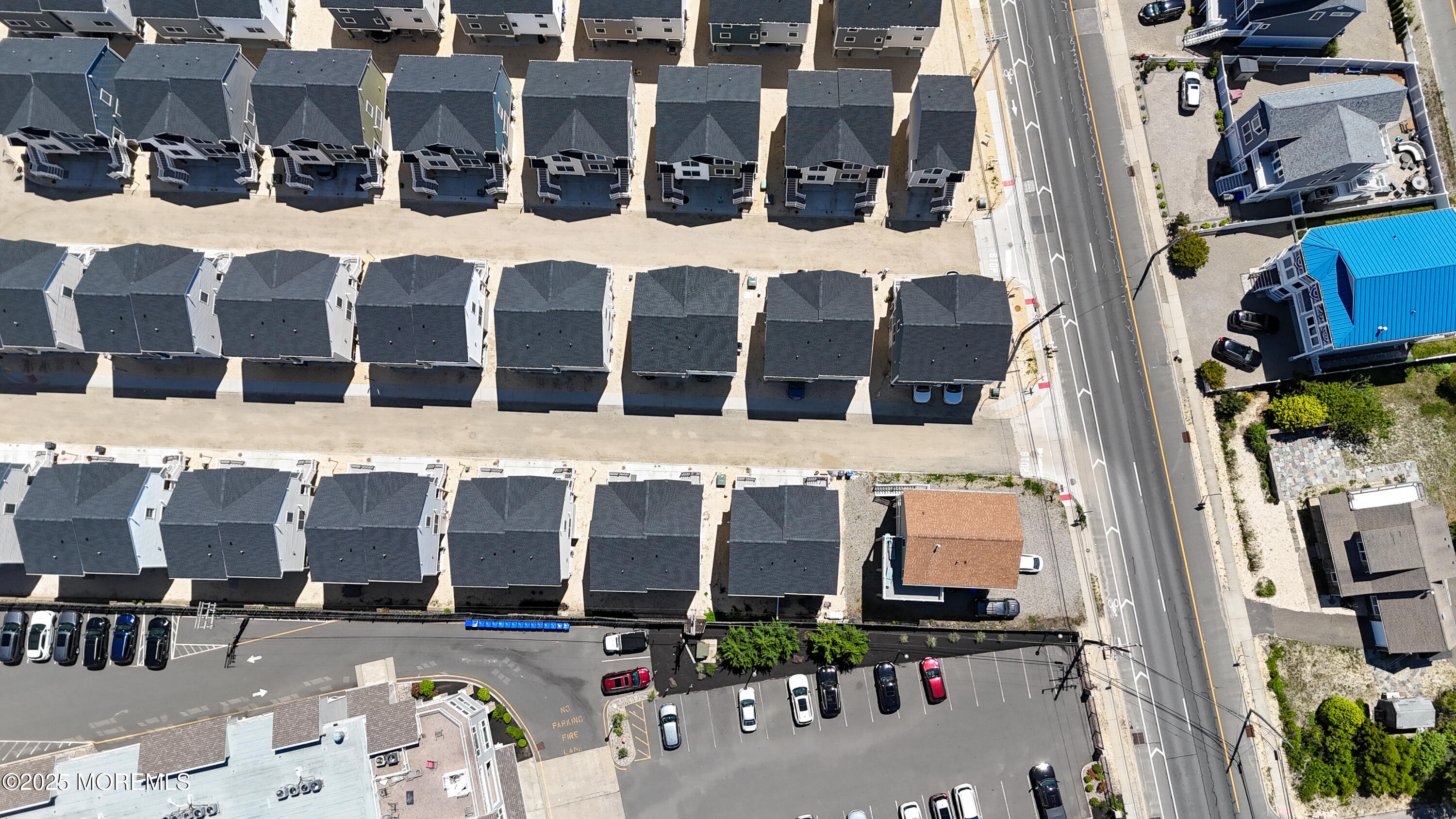 8 Shell Road Mantoloking, NJ 08738 - Photo 27 of 29 a building with multiple windows