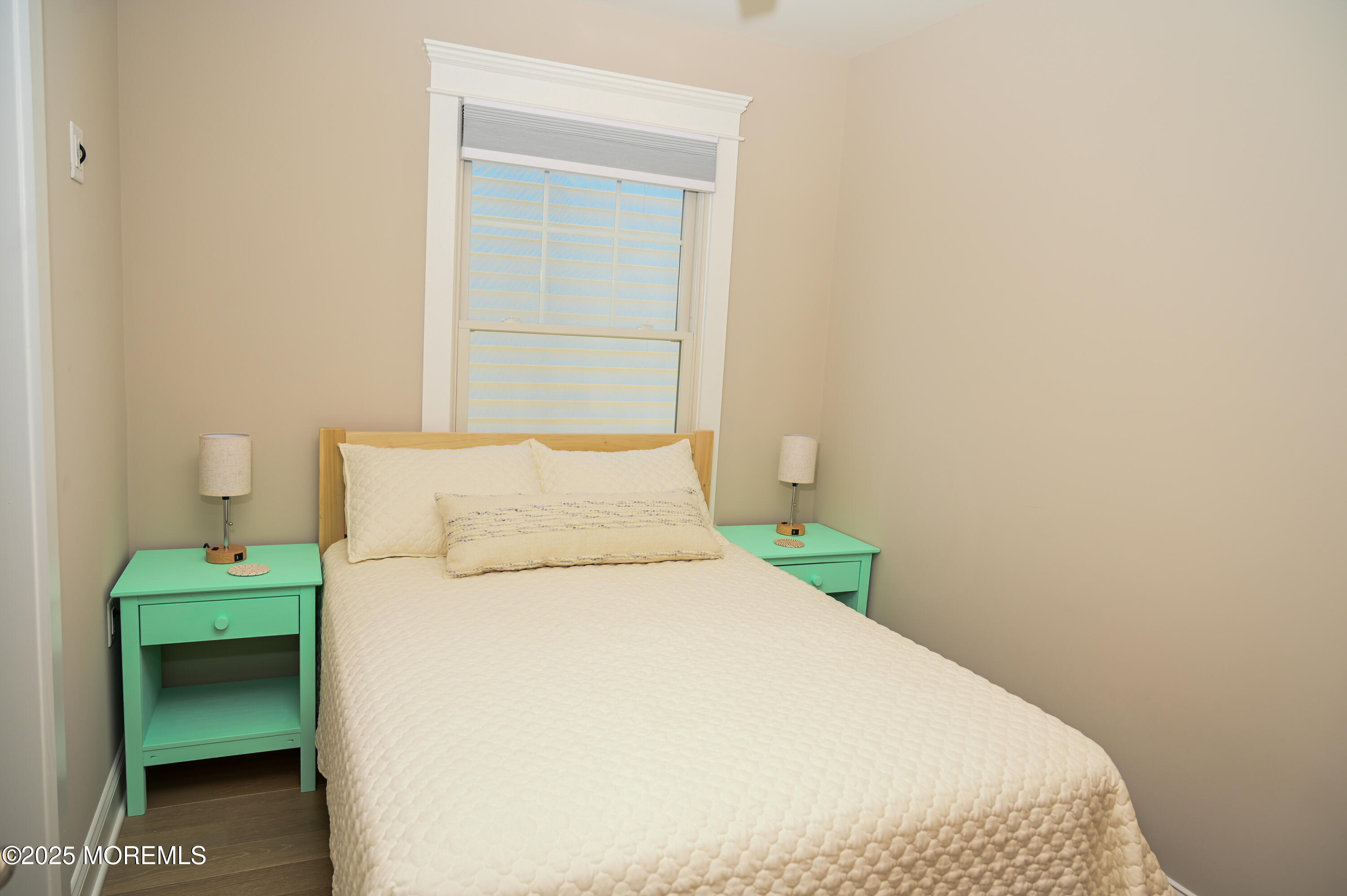 8 Shell Road Mantoloking, NJ 08738 - Photo 10 of 29 a bedroom with a bed and a cabinets