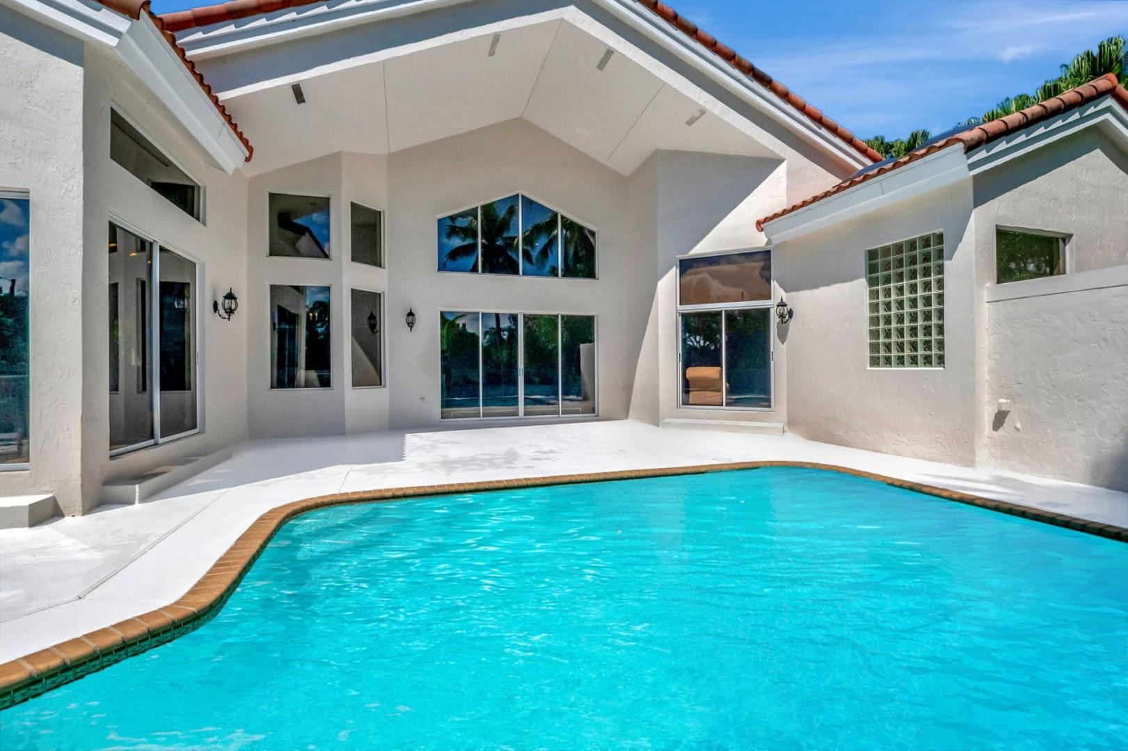 6096 Northwest 30th Way Boca Raton, FL 33496 - Photo 17 of 24 a view of pool with yard
