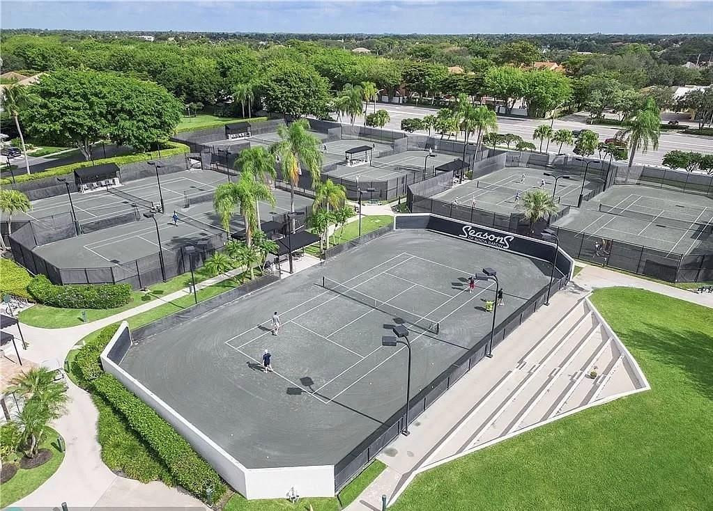 6096 Northwest 30th Way Boca Raton, FL 33496 - Photo 22 of 24 an aerial view of a house with a yard