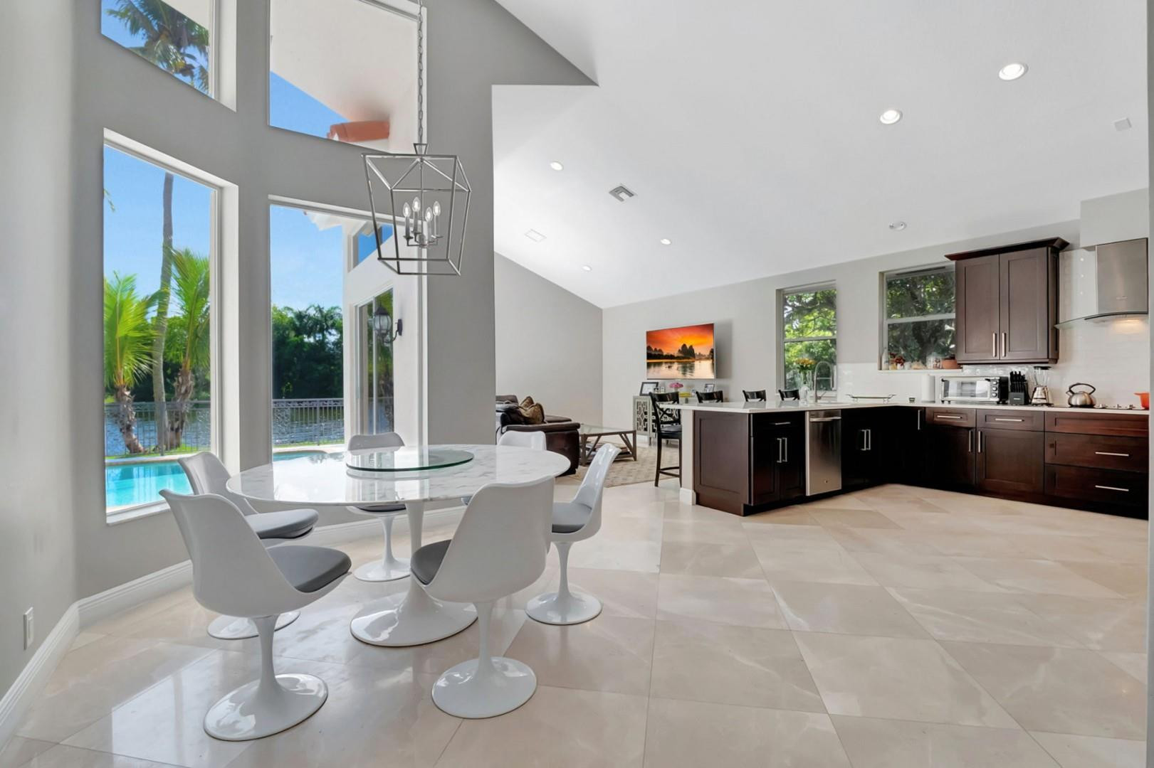 6096 Northwest 30th Way Boca Raton, FL 33496 - Photo 5 of 24 a kitchen with a sink and cabinets