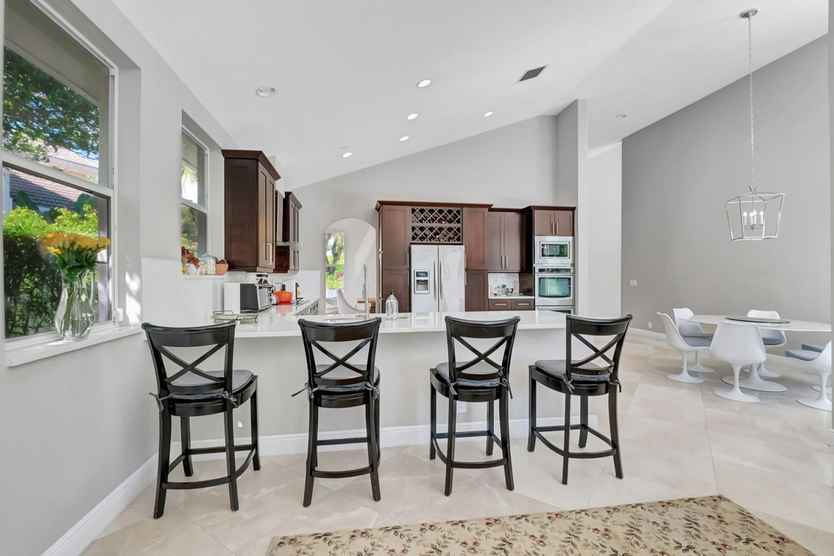 6096 Northwest 30th Way Boca Raton, FL 33496 - Photo 8 of 24 a view of a dining room with furniture