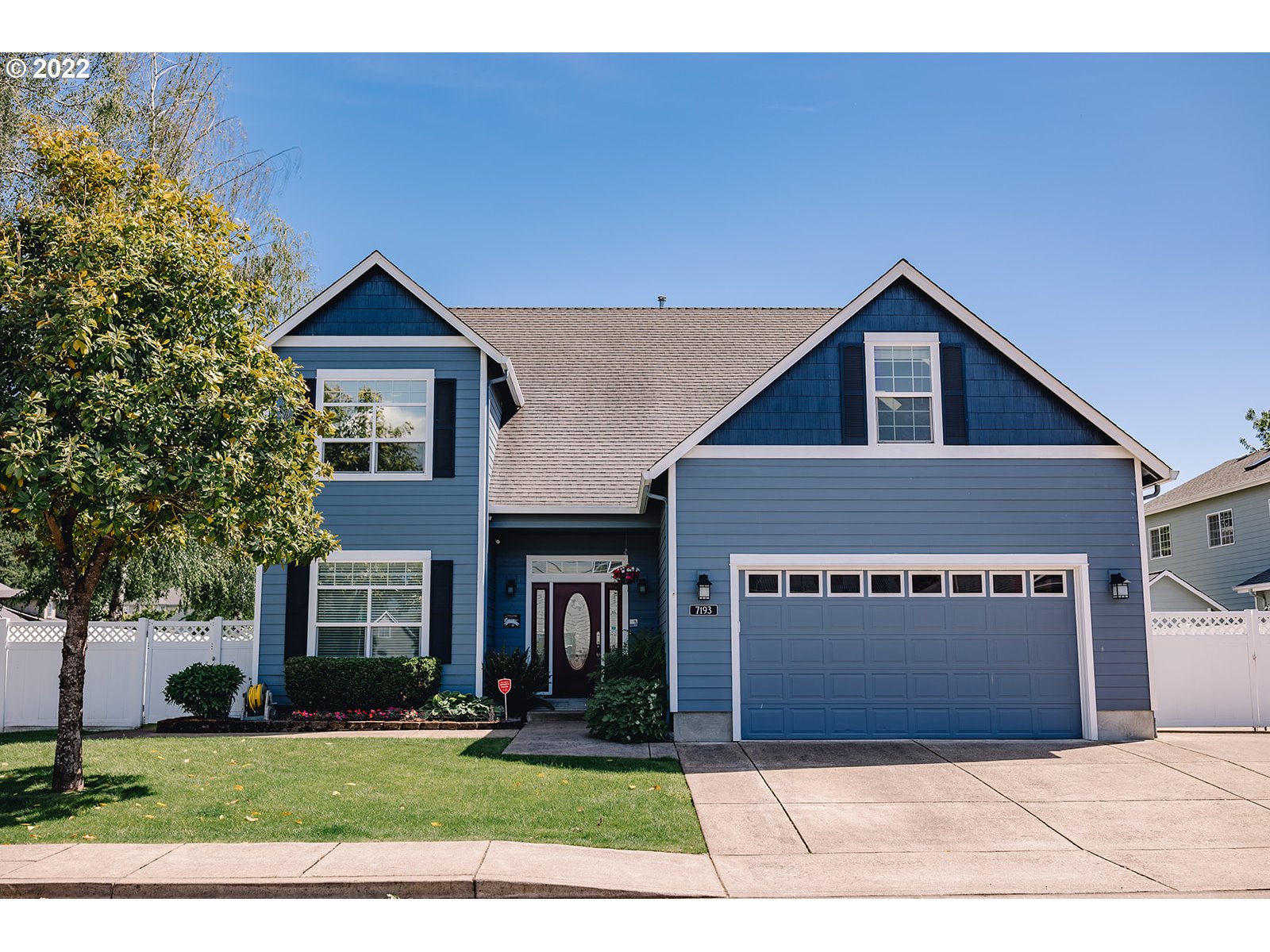 7193 F Place Springfield, OR 97478 - Photo 1 of 32 a front view of a house with a yard and garage