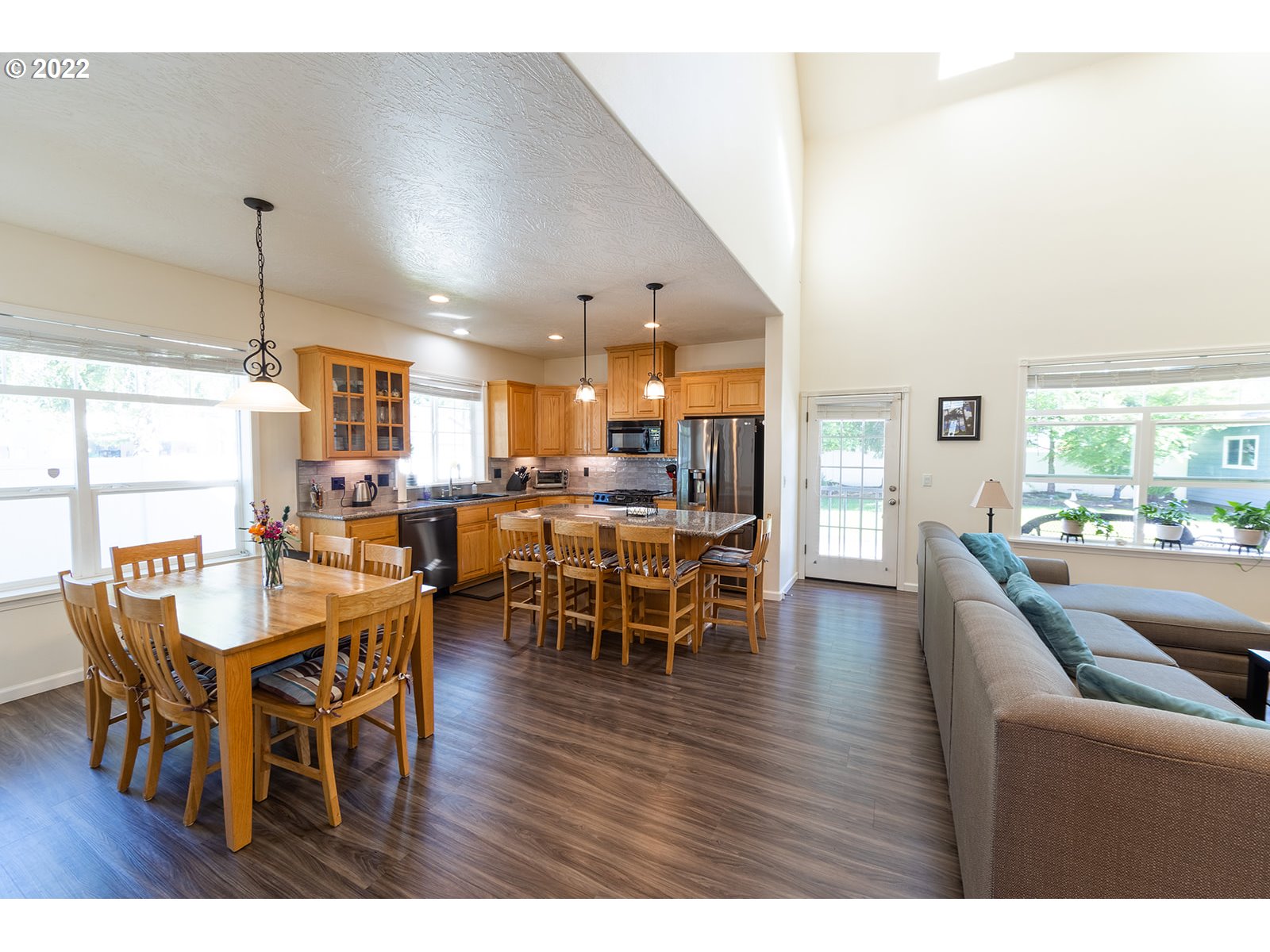 7193 F Place Springfield, OR 97478 - Photo 6 of 32 a dining room with furniture and wooden floor