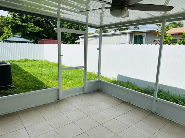 a view of backyard with green space